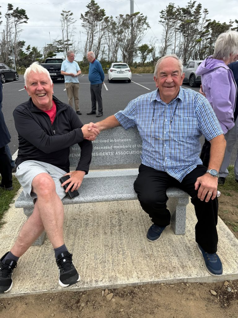 Denis Mulgannon of the current RRA committee and Michael Duffy, former chair of the RRA at the unveiling of the RRA Memorial Bench, 15 August 2026